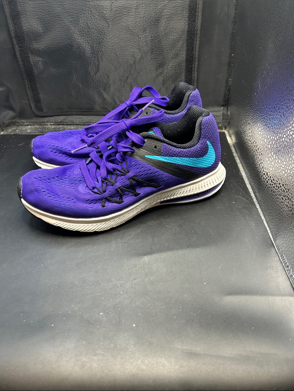 Nike Purple Running Shoes with Teal Swoosh